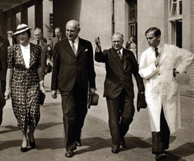 Milada Horáková and Alois Štůla (second from the left) accompanying british minister of health in Masaryk Houses, 1937